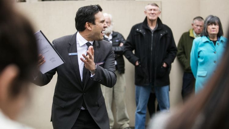 Stephen Smith, of Marshall White, in action during the auction of the property at 17 New Street, Brighton. Photo: Craig Sillitoe