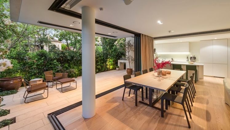 This two-bedroom ground-floor apartment at 1/55 Davis Avenue in South Yarra extends the living area. Photo: Orchard Piper